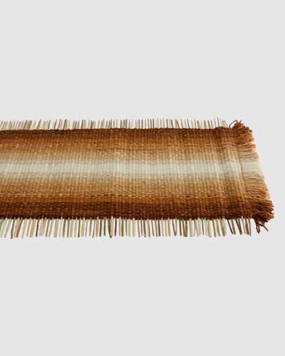 Handcrafted terracotta table runner with graduated shading
