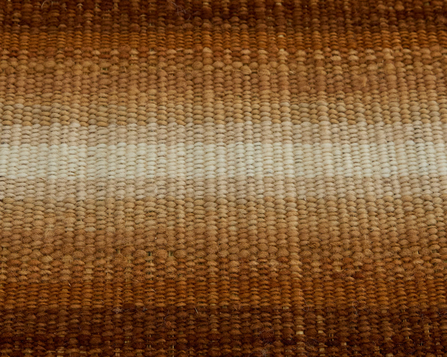 Handcrafted terracotta table runner with graduated shading