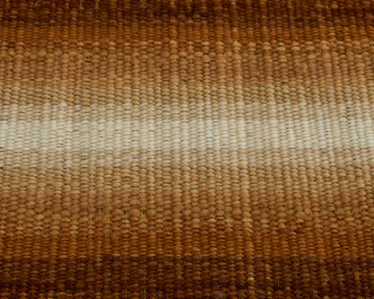 Handcrafted terracotta table runner with graduated shading